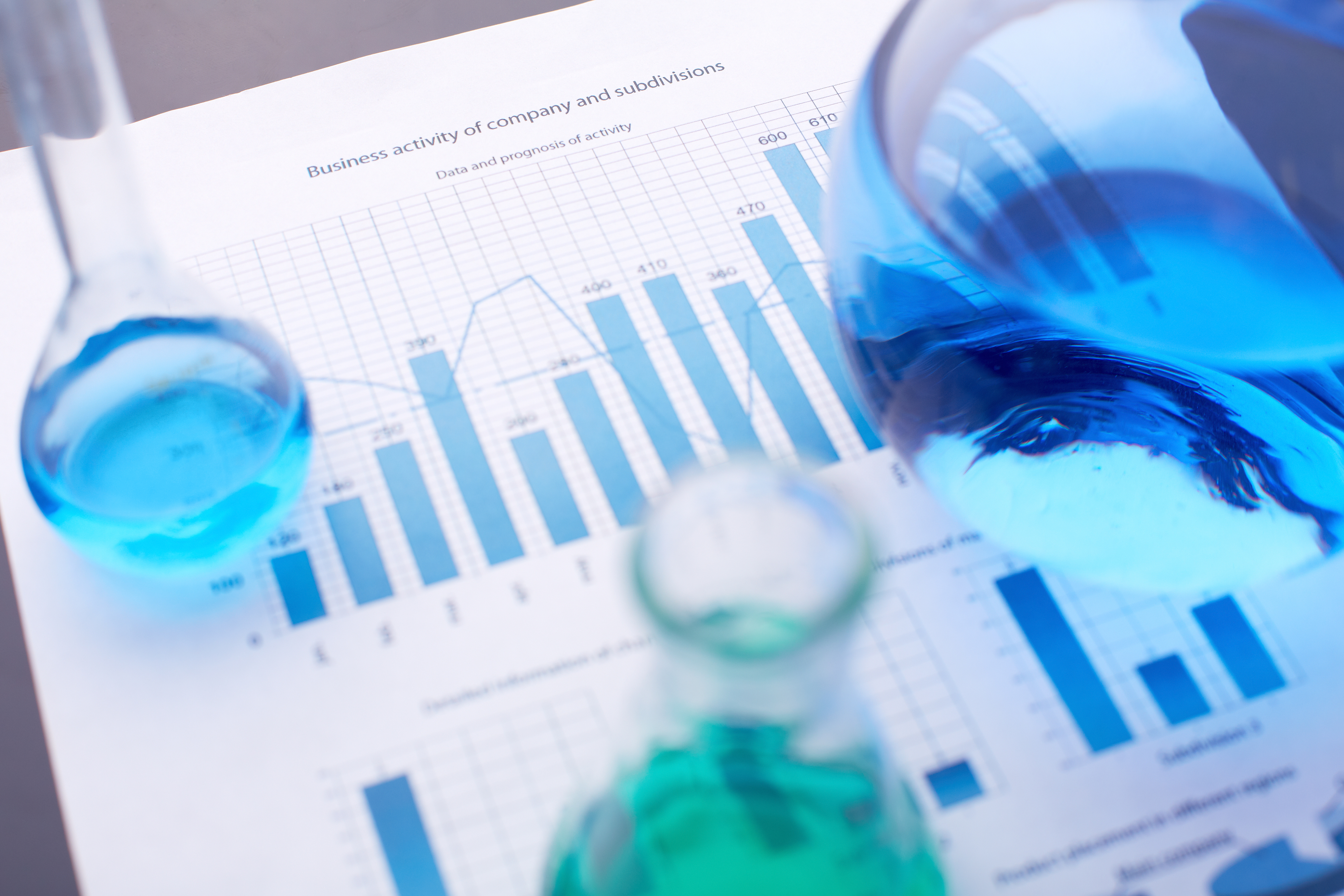 Statistical documents with laboratory test tubes